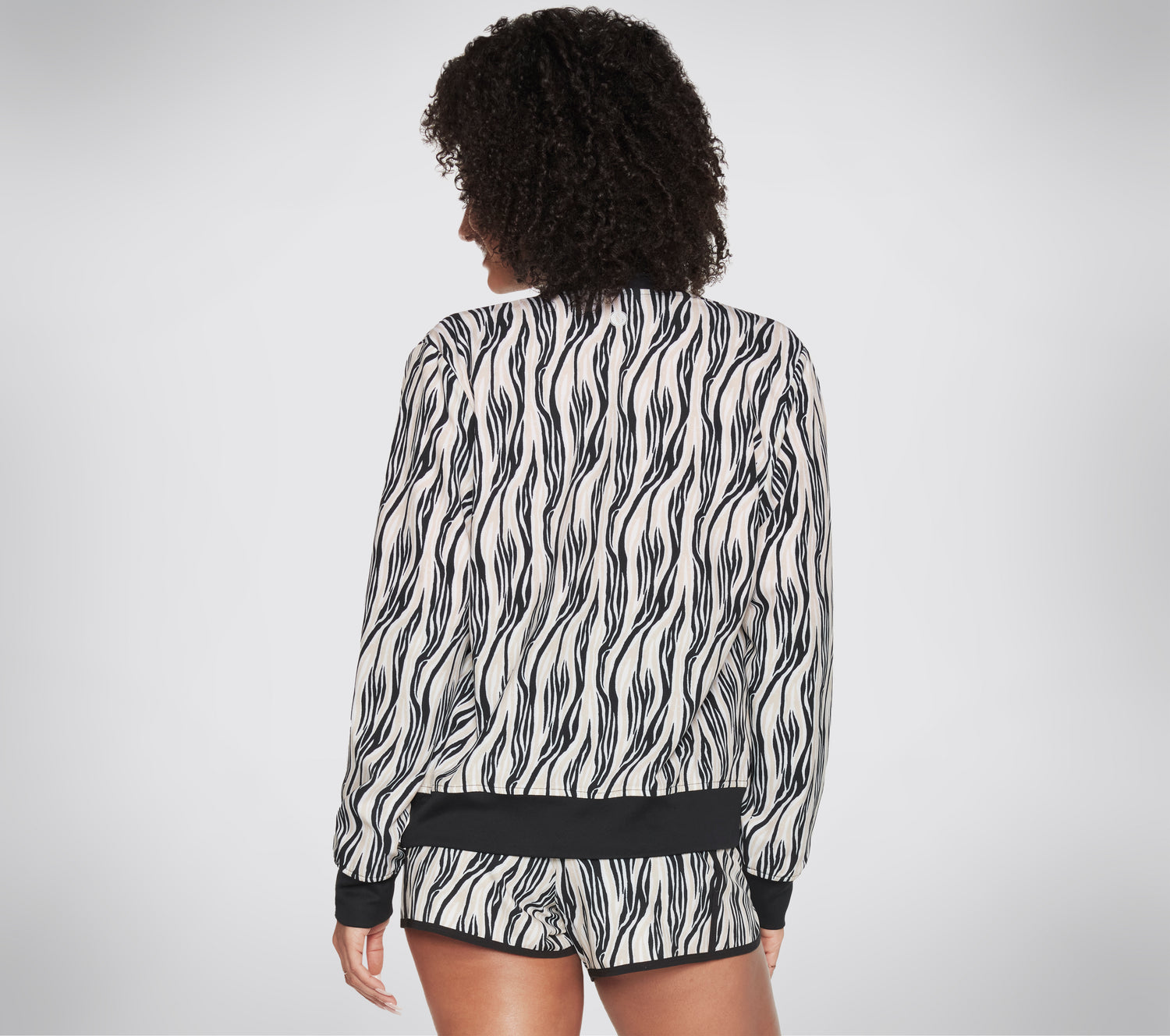 DVF: Skechweave Moving Zebra - Vendbar Bomberjakke Clothes Skechers